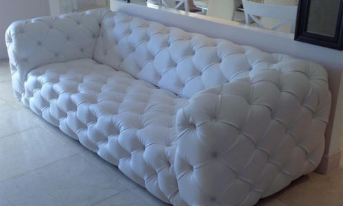white sofa with buttons installed at residential property interiors doral fl